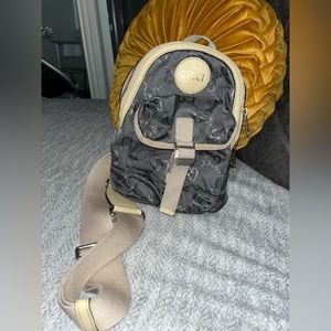 *Authentic Gucci off grid sling backpack *
